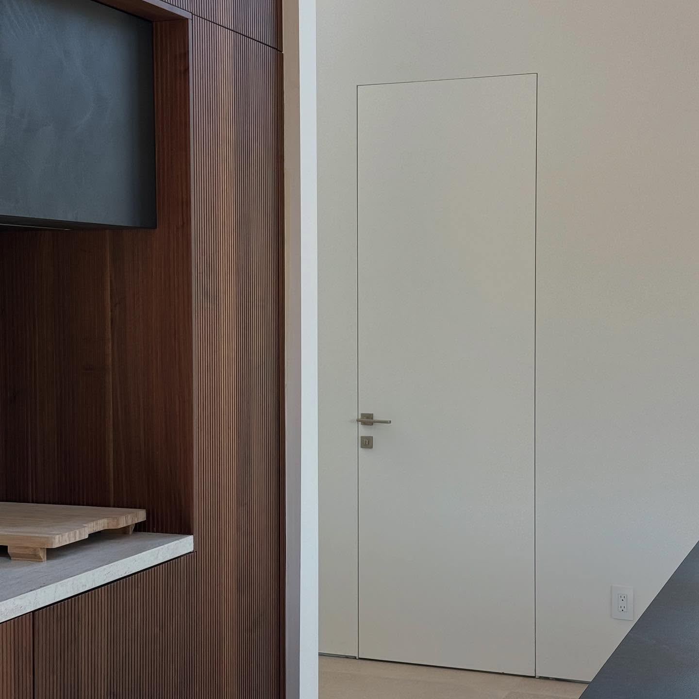 Modern frameless door installation in Palm Coast